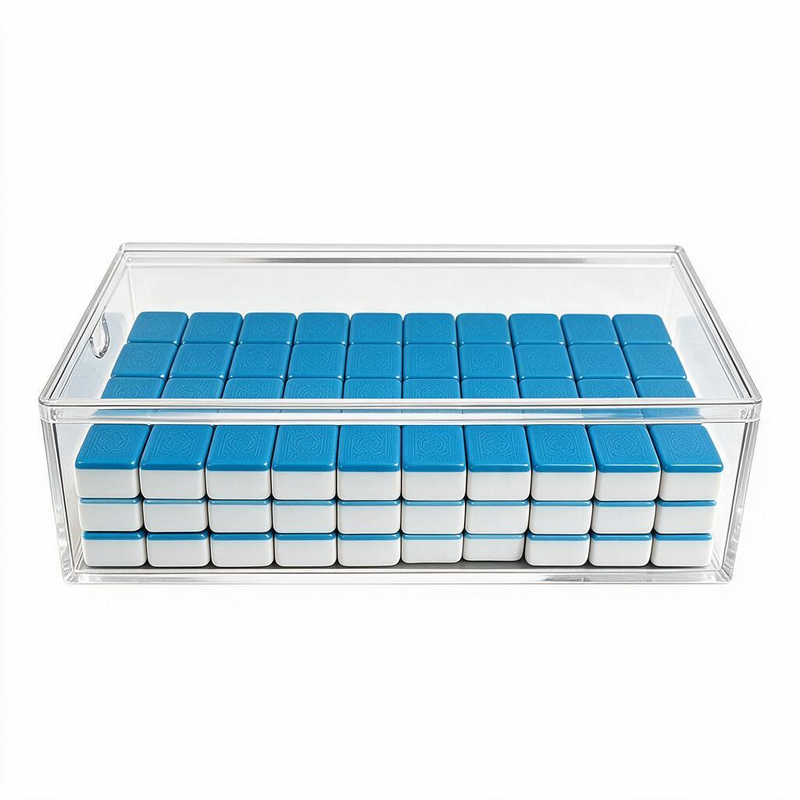 clear acrylic mahjong tile storage box with sliding lid for organizing, protecting, and displaying American mahjong tiles.