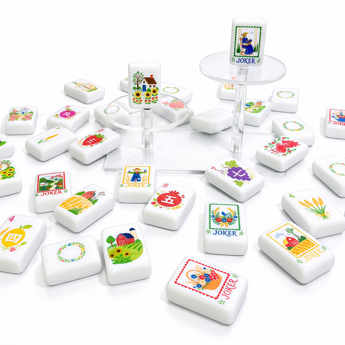 Country Garden American Mahjong tiles scattered to show colorful flowers, fruit, farmhouses, winds, dragons and joker designs