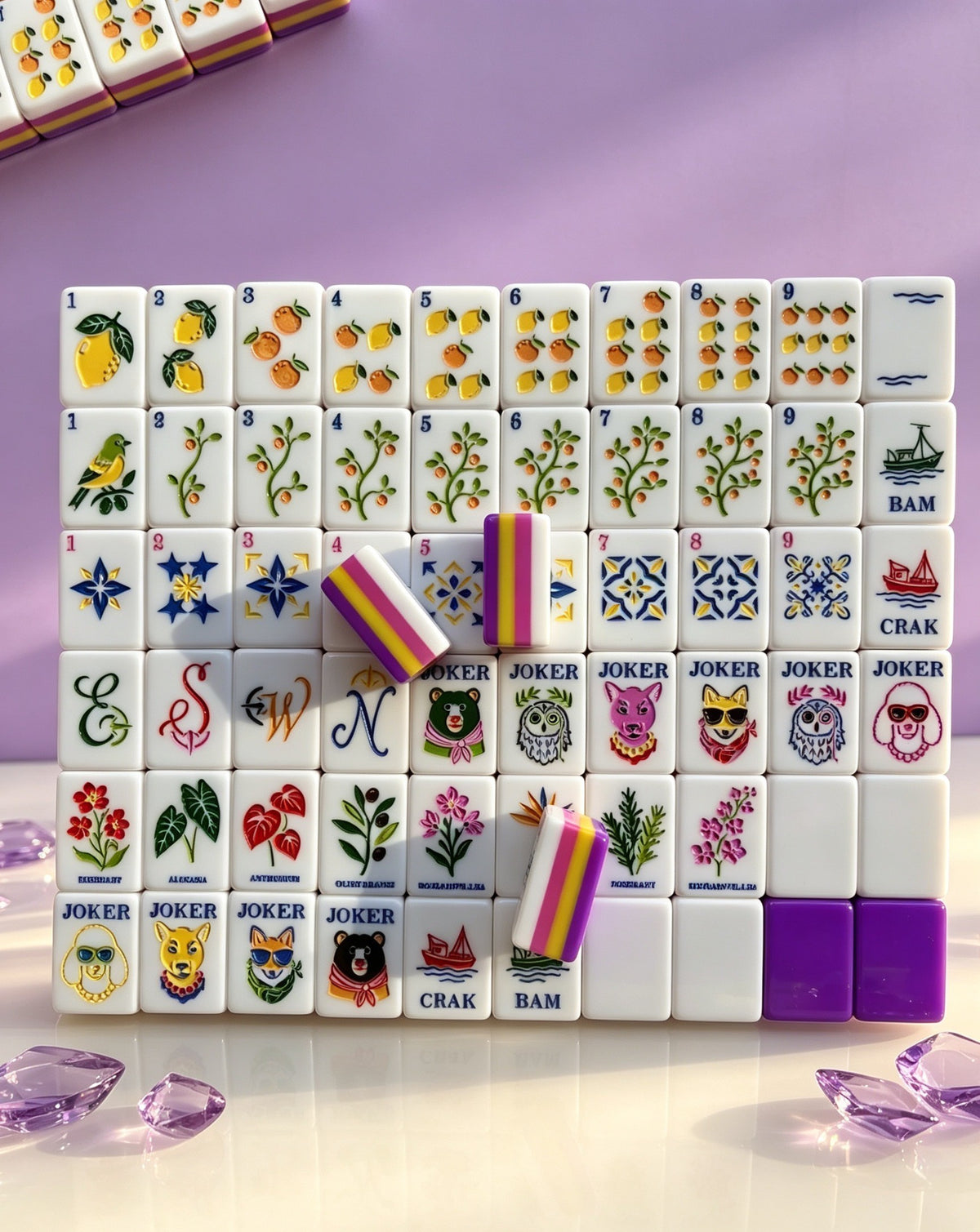 Citrus Grove American Mahjong Tile Set with lemon and orange Dots, botanical Bams, blue patterned Craks, flowers and colorful Jokers.
