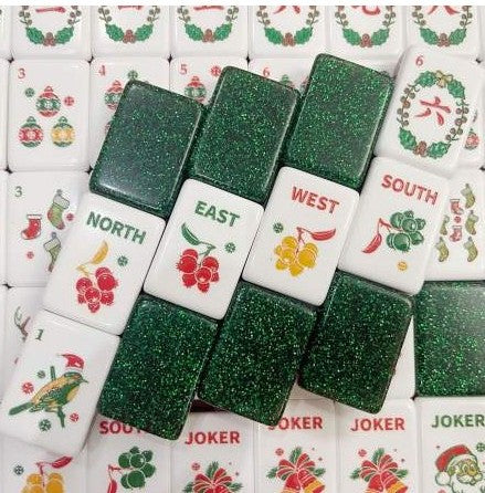 Christmas American Mahjong North, East, West and South wind tiles with festive artwork and sparkling green glitter backs